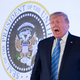 President Donald Trump stands in front of a photoshopped presidential seal on July 23, 2019 in Washington, D.C.